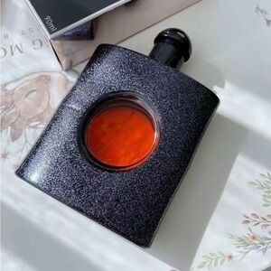Yves Saint Laurent Black and Orange Fragrance Bottle